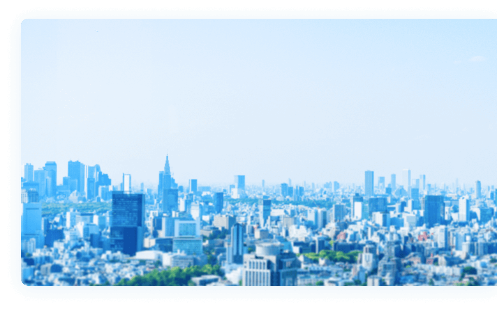 都市の風景をぼかした背景イメージ